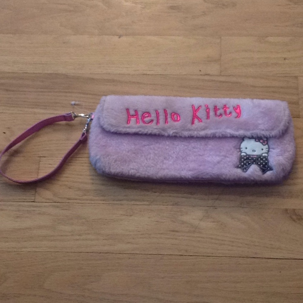 Hello kitty furry wristlet new w/o tags.